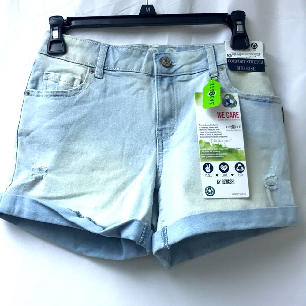 The girlfriend jeans shorts distressed blue size 0 mid rise